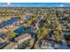 Wide angle aerial view showcasing two bodies of water and the community and the surrounding area at 4173 Hibiscus Dr. # 204, Little River, SC 29566