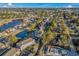 Wide angle aerial view showcasing two bodies of water and the community and the surrounding area at 4173 Hibiscus Dr. # 204, Little River, SC 29566