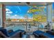 Comfortable covered balcony offering scenic views of the pool and surrounding neighborhood at 4173 Hibiscus Dr. # 204, Little River, SC 29566