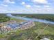 Panoramic aerial view of the community's waterfront, including the marina and townhouses at 4396 Baldwin Ave. # 138, Little River, SC 29566