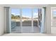 Balcony with glass sliding doors and scenic waterfront views at 4396 Baldwin Ave. # 138, Little River, SC 29566