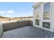 A view from the deck featuring gray wood, a partial view of the waterway, and clear blue skies at 4396 Baldwin Ave. # 138, Little River, SC 29566