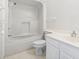 Bathroom featuring a shower and tub combo, white fixtures, and vanity with plenty of counter space at 4396 Baldwin Ave. # 138, Little River, SC 29566
