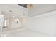 Spacious living area featuring recessed lighting, an archway to the kitchen, and carpeted flooring at 4396 Baldwin Ave. # 138, Little River, SC 29566