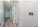 Hallway with a coat rack, door to a closet, and hookups for a washer and dryer at 4445 Kingsport Rd. # 406, Little River, SC 29566
