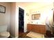 Bathroom features a vanity, large mirror and view into the walk-in closet at 449 Pennington Loop, Myrtle Beach, SC 29588