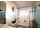 Bright bathroom featuring a shower and tub combination with beach-themed decor and a decorative shower curtain at 449 Pennington Loop, Myrtle Beach, SC 29588