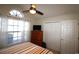 Bedroom featuring a window, closet space, and ceiling fan with window blinds at 449 Pennington Loop, Myrtle Beach, SC 29588