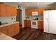 Well-lit kitchen with ample cabinet space, marble countertops, and modern appliances at 449 Pennington Loop, Myrtle Beach, SC 29588