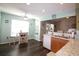 Well-designed kitchen with breakfast nook, wood cabinets, and stainless steel sink at 449 Pennington Loop, Myrtle Beach, SC 29588
