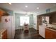 Bright and airy kitchen with modern finishes, wooden cabinets, and a cozy breakfast nook at 449 Pennington Loop, Myrtle Beach, SC 29588