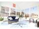 Bright sunroom with large windows, comfortable seating, and decor, perfect for relaxation and enjoying natural light at 449 Pennington Loop, Myrtle Beach, SC 29588