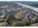 Waterfront community aerial showcasing a marina, various ponds, and manicured landscaping at 4545 Lighthouse Dr. # 28C, Little River, SC 29566