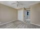 Bedroom with neutral paint, carpet, a ceiling fan, and closet for storage at 4545 Lighthouse Dr. # 28C, Little River, SC 29566