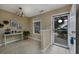 Bright foyer with tiled floors, decorative console table, and natural light from the entrance door at 4545 Lighthouse Dr. # 28C, Little River, SC 29566