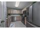 A modern kitchen with stainless steel appliances, granite countertops, and stylish cabinets at 4545 Lighthouse Dr. # 28C, Little River, SC 29566