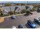 Community parking spaces with manicured hedges and lush lawns surrounding homes at 4545 Lighthouse Dr. # 28C, Little River, SC 29566