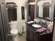 Well-organized bathroom with modern vanity and convenient storage shelves at 501 44Th Ave. N # A-11, Myrtle Beach, SC 29577