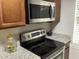 Stainless steel appliances, including a microwave and electric range at 501 44Th Ave. N # A-11, Myrtle Beach, SC 29577