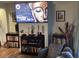Living room with modern decor, including mounted art and bookshelves at 501 44Th Ave. N # A-11, Myrtle Beach, SC 29577