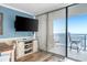 View from the living room onto the balcony featuring ocean views and outdoor seating for relaxing or enjoying a meal at 5523 North Ocean Blvd. # 1912, Myrtle Beach, SC 29577
