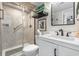 Bright, modern bathroom with a glass enclosed shower and ample storage at 5523 North Ocean Blvd. # 1912, Myrtle Beach, SC 29577