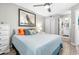 Bedroom with comfortable bed, ceiling fan and access to the bathroom at 5523 North Ocean Blvd. # 1912, Myrtle Beach, SC 29577