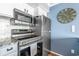 Modern stainless steel appliances including a range, microwave, and refrigerator at 5523 North Ocean Blvd. # 1912, Myrtle Beach, SC 29577