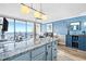 Open concept living area with balcony access and comfortable seating at 5523 North Ocean Blvd. # 1912, Myrtle Beach, SC 29577