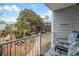 Balcony view of courtyard with picnic tables, grills, walking path and beautiful landscaping at 5905 South Kings Hwy. # 4219-D, Myrtle Beach, SC 29575