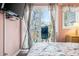 This bedroom has a view to the outside from the balcony door with sheer seahorse curtains at 5905 South Kings Hwy. # 4219-D, Myrtle Beach, SC 29575