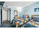 Comfortable bedroom with two twin beds, ample storage, and tasteful décor, offering a welcoming atmosphere at 5905 South Kings Hwy. # 4219-D, Myrtle Beach, SC 29575