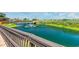 Walk along the boardwalk on a lush pond with a beautiful water feature at 5905 South Kings Hwy. # 4219-D, Myrtle Beach, SC 29575