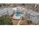 Aerial view showing a pool with lounging chairs and community buildings at 5905 South Kings Hwy. # 4107-D, Myrtle Beach, SC 29575