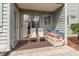 Inviting back porch with seating, storage, and sliding glass doors for easy indoor-outdoor flow at 5905 South Kings Hwy. # 4107-D, Myrtle Beach, SC 29575