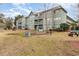 Exterior lawn offers bench swings, picnic tables, and community barbecue grills at 5905 South Kings Hwy. # 4107-D, Myrtle Beach, SC 29575