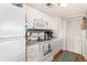 Well-equipped kitchen with white cabinets, modern appliances, and ample storage, enhancing functionality at 5905 South Kings Hwy. # 4107-D, Myrtle Beach, SC 29575