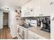 Functional kitchen with white cabinetry, modern appliances, and a breakfast bar, ideal for meal preparation at 5905 South Kings Hwy. # 4107-D, Myrtle Beach, SC 29575