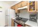 Well-equipped kitchen with modern stainless steel appliances and ample cabinet storage at 597 Blue River Ct. # H2, Myrtle Beach, SC 29579