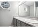 Bathroom featuring double sinks, a large mirror, and neutral tones for a serene and functional space at 6006 Quinn Rd., Myrtle Beach, SC 29579
