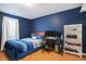 Bedroom with hardwood floors, a bed, a desk and a window at 6006 Quinn Rd., Myrtle Beach, SC 29579