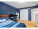 Bedroom with a closet, white shelving, and desk area, perfect for studying and organization at 6006 Quinn Rd., Myrtle Beach, SC 29579