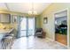 Bright dining area with backyard view, adjacent to the kitchen and bedroom at 6006 Quinn Rd., Myrtle Beach, SC 29579