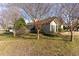 A charming single-story home with well-maintained landscaping and mature trees at 6006 Quinn Rd., Myrtle Beach, SC 29579