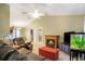 A spacious living room with vaulted ceiling and a fireplace as a focal point at 6006 Quinn Rd., Myrtle Beach, SC 29579