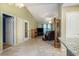 Bright living room with high ceilings, tile flooring, and stylish furnishings at 6006 Quinn Rd., Myrtle Beach, SC 29579