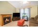 Comfortable living room with a fireplace, television, and comfortable seating area at 6006 Quinn Rd., Myrtle Beach, SC 29579