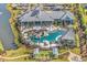 Aerial view of community clubhouse with pool, lounge areas, and manicured grounds at 6069 Tramonto St., Myrtle Beach, SC 29572