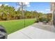 Backyard featuring a large patio and manicured lawn at 6069 Tramonto St., Myrtle Beach, SC 29572