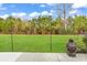 Spacious backyard featuring a lush lawn and mature landscaping at 6069 Tramonto St., Myrtle Beach, SC 29572